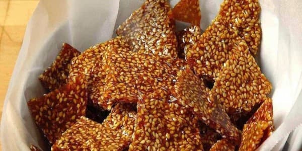 تصویر 1 از خرید پولکی کنجدی خانگی + قیمت فروش استثنایی
