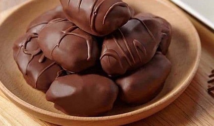 تصویر 5 از قیمت خرید شکلات خرمایی مغزدار + فروش ویژه
