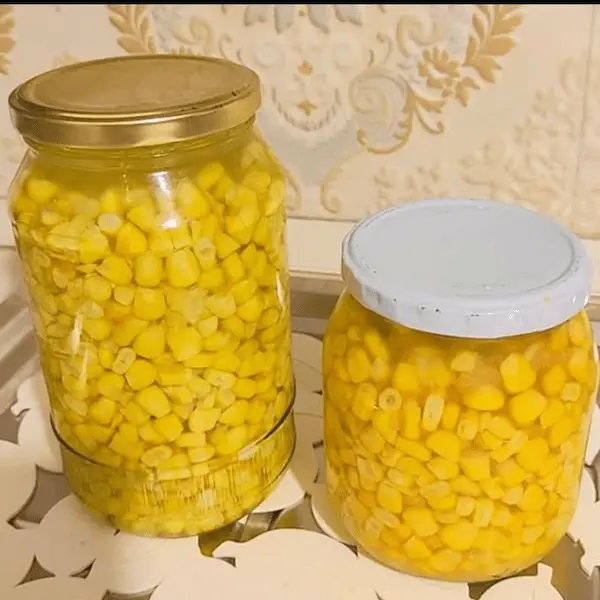 تصویر 2 از کنسرو ذرت شیرین دلپذیر یک مؤلفه غذایی مغذی در منوی روزانه