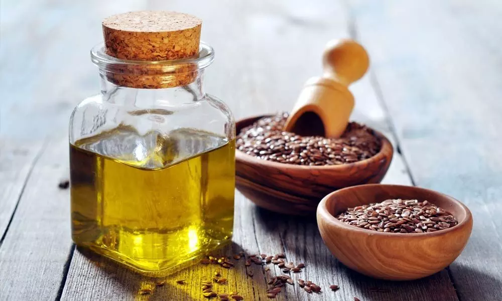 خرید روغن کنجد روازاده + قیمت فروش استثنایی
