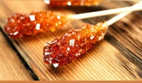 تصویر 1 از توزیع نبات قهوه ای شاخه ای بسته بندی رضوان