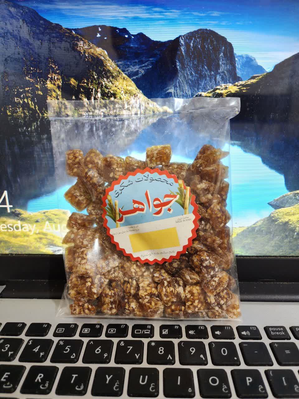 تصویر 1 از توزیع آبنبات تولید شده با شکر قهوه ای