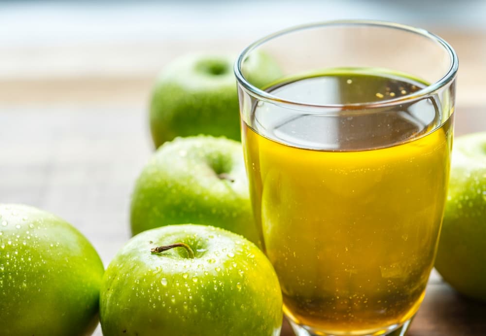 تصویر 2 از قیمت ابمیوه سیب طبیعی + خرید بورنکردنی