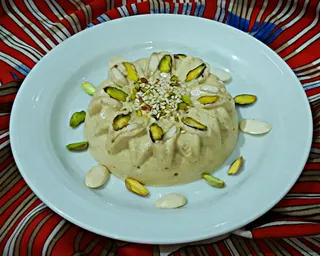 تصویر 2 از خرید حلوا ارده ۷۰۰ گرم گرد با قیمت همکاری