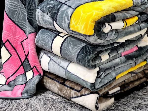 پتو طرح دار با ترکیبی از نخ های با کیفیت بالا و طراحی زیبا