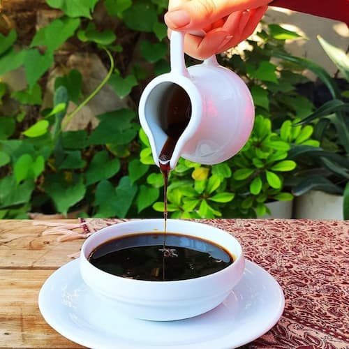 تصویر 4 از شیره خرما غلیظ با طعم طبیعی و رنگ تیره براق
