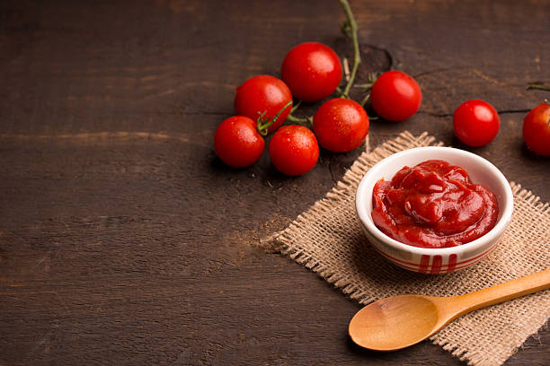 تصویر 1 از رب گوجه‌ فرنگی اتکا با نمک و ادویه طبیعی مناسب غذا های محلی